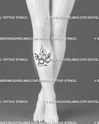 Angel and devil cherry tattoo stencil shown on the upper shin below the knee with joined stems, tall flames, opposing wings, halo, horns, and devil tail