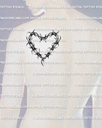 Barbed wire heart outline tattoo shown on men’s shoulder blade placement preview
