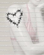 Barbed wire heart tattoo stencil shown on women’s upper arm near shoulder placement preview