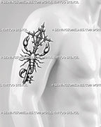 Blackwork scorpion key tattoo displayed on men's arm, with a wrapped scorpion body, sharp claws, and gothic key details