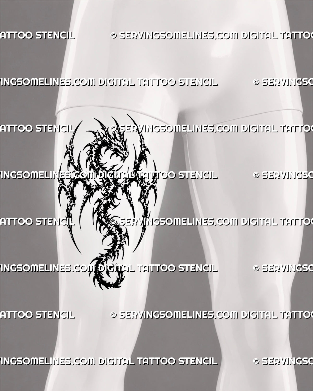 Blackwork winged dragon tattoo shown on a man’s front thigh with horned fantasy head, broad wings, fragmented tribal shapes, sharp points, and curled tail