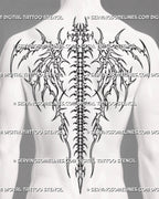 Bone wings spine tattoo shown on a man’s full back with mirrored skeletal wings, vertebral column, cyber tribal details, and wide shoulder framing