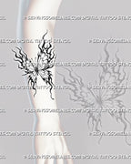 Butterfly tattoo with flames shown on the forearm with a slim central body, extended fire wings, pointed tips, and flowing vertical composition