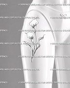 Calla lily tattoo shown on the front of a female thigh with two layered blooms, crossing stems, sweeping leaves, and soft stippled detail