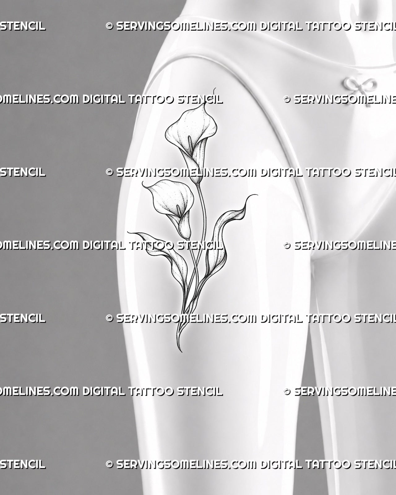 Calla lily tattoo shown on the front of a female thigh with two layered blooms, crossing stems, sweeping leaves, and soft stippled detail