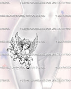 Cherub with flowers tattoo shown on a woman’s hip with two large lilies, raised angel wings, botanical curves, and detailed blackwork shading