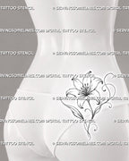 Decorative lily outline tattoo shown on the side of women’s lower back with an open flower, curved stem, pointed leaves, and flowing ornamental lines