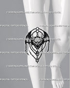 Devil tattoo stencil shown on knee with winged demon face, bat wings, chains, and bold dark fantasy detail