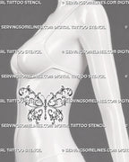 Filigree butterfly tattoo shown on a woman’s side body with flowing botanical scrollwork, ornate wings, and jewelry-inspired details