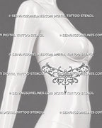 Filigree dragonfly tattoo shown on a woman’s ribs with sweeping baroque scrollwork, curved botanical wings, and an elongated jewel ornament below the body