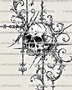 Close detail of filigree skull tattoo stencil showing shaded eye sockets, individual teeth, bone cracks, fine stippling, spiral scrollwork, and pointed ornament
