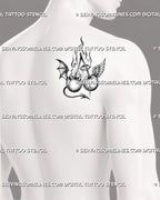 Flaming angel and devil cherry tattoo shown on men’s shoulder blade with paired cherries, contrasting wings, halo, horns, and curved pointed tail