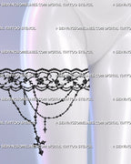 Floral lace thigh band tattoo shown on a woman’s upper thigh with ornamental flowers, curling vines, jewelry-like chains, and dark feminine garter styling