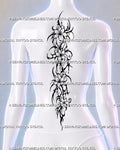 Floral spine tattoo shown on a woman’s center back with four open flowers, flowing dark ornament, sharp black curves, and a long feminine vertical composition