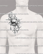 Gothic filigree skull tattoo shown on a man’s side chest near the collarbone with ornate scrollwork, detailed teeth, dark shading, and sharp decorative extensions