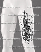 Gothic spire tattoo stencil shown on men’s thigh with cybersigilism tower structure, arched windows, crescent moon accents, and sharp dark fantasy detail