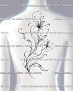 Lily flower back tattoo shown in a medium-size placement across women’s upper and mid back with two flowers, a bud, curved leaves, and elegant asymmetrical movement