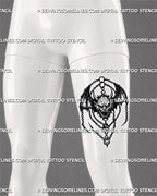Medieval devil flash tattoo stencil shown on men’s thigh with winged demon face, chain details, bat wings, and dark fantasy blackwork texture
