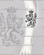 Medieval lion tattoo stencil shown on forearm with heraldic lion pose, crown above the head, raised claws, curled tail, and old-world gothic linework