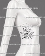 Mystical seraphim eye tattoo shown on a woman’s side ribs with six stylized wings, celestial stars, ornamental curls, and whimsical angel linework