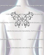 Ornamental butterfly tattoo shown at the center of a woman’s upper back with wide symmetrical wings and a hanging jewel aligned with the spine