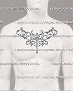 Ornamental dragonfly tattoo shown at the center of a man’s chest with balanced filigree wings, a segmented insect body, and a hanging decorative pendant