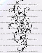 Ornamental lily thigh tattoo stencil with an open flower, baroque-inspired filigree scrollwork, dark leafy accents, starbursts, and draped chain ornament