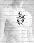 Sacred heart dagger tattoo shown on men’s center chest placement with dark heart shading and flame detail