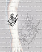 Sacred heart dagger tattoo stencil shown on forearm placement with flame, thorn wrap, and diagonal blade