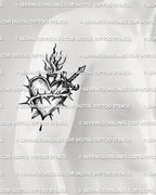 Sacred heart and dagger tattoo stencil shown on men’s upper arm placement with dagger and thorn wrap detail