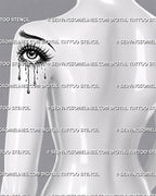 Sad eye tattoo stencil shown on upper arm, with long lashes, glossy pupil highlights, dotted shading, and tears under the lid.