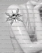 Small seraphim eye tattoo shown on womens arm placement, with compact wings, central eye, and sharp starburst detail. 