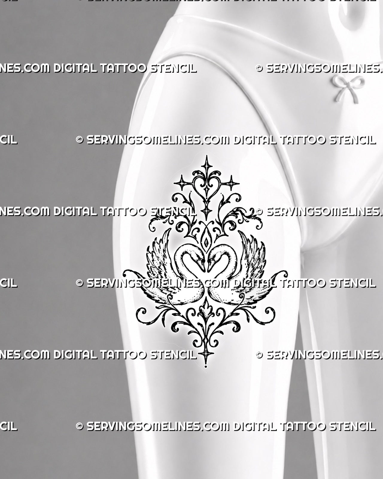 Two swans heart tattoo shown on a woman’s front thigh with broad feathered wings, mirrored filigree, central heart ornaments, and a tall symmetrical composition