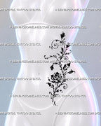 Whimsical rose vine tattoo shown along a woman’s side ribs with a trailing floral stem, curled tendrils, rosebuds, and asymmetric black ink movement
