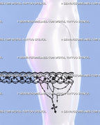 Wraparound lace thigh tattoo shown from the side on a woman’s thigh with a floral garter band, repeating ornamental lace, draped chains, and gothic pendant detail