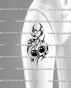Y2K neotribal cherry tattoo shown on women’s thigh with twin cherries, bold black curves, crossed stems, pointed ornament, and heart-shaped detail