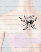 all seeing eye with upward wings displayed at the center of womens chest offering a clean spiritual focal point
