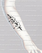 Forearm tattoo design of bleeding hearts pierced by thorns, symbolic love hurts flash for minimal blackwork emotional tattoos. 