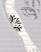 Cat eyes tattoo stencil displayed on forearm placement example, sharp eyeliner style eyes-only tattoo design download.
