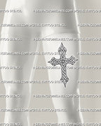 Celtic cross tattoo design shown on men's front thigh, with ringed cross structure, knotwork detail, and bold stencil preview.