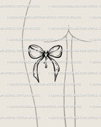 coquette style bow tattoo stencil with devil heart center shown on back of thigh placement for feminine gothic tattoo inspiration