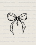 cute gothic bow tattoo stencil with devil heart center shown as clean linework design for coquette and small feminine tattoo ideas