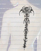 Cyber rose spine tattoo shown on men’s back placement with a centered bloom and long vertical back flow