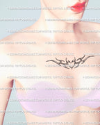 Small cyber tribal heart tattoo stencil shown on woman’s chest center, digital feminine design with spiked wings and clean ornamental symmetry.