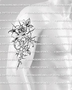 Cybersigilism rose tattoo shown on men’s upper arm placement with a readable floral silhouette and darker edge