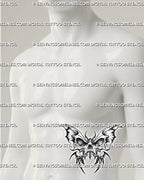 Dark butterfly stencil with skull body shown on mens side stomach placement example, printable tattoo design files.