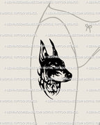 Doberman tattoo stencil displayed on a woman’s hip to show curved fit. Gothic linework dog head with bold neotribal detail styled for sleek side placement.