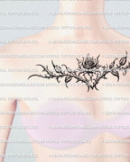 Feminine gothic rose tattoo stencil shown on womens chest placement, elegant ornamental floral rose design offered as a digital stencil product download