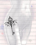 Feminine hip placement of a gothic heart-shaped key tattoo stencil, combining winged design and royal gothic ornamentation.