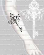 Forearm placement example of a gothic winged key tattoo design, shown as a printable digital tattoo stencil with dark ornamental detail.